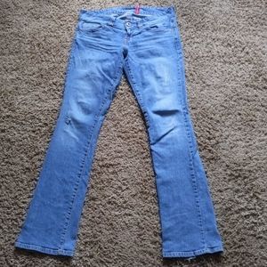 Light wash boot cut Daredevil jeans distressed